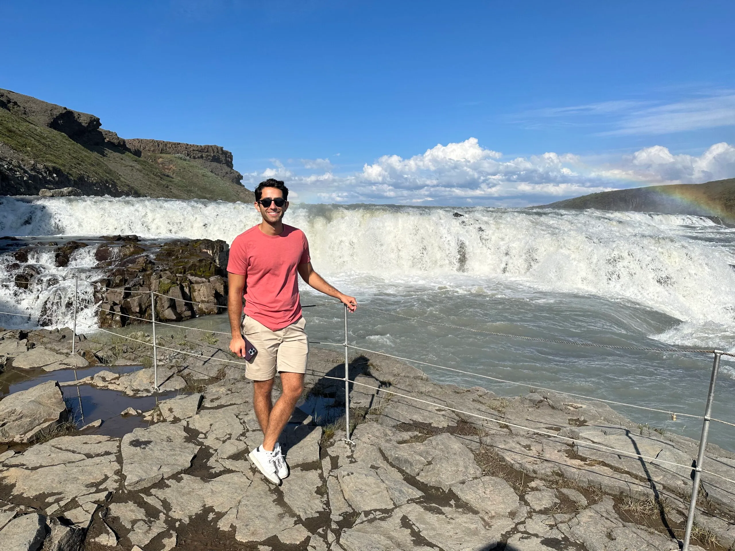 Author of Imperfect Nostalgia in front of waterfall in Iceland